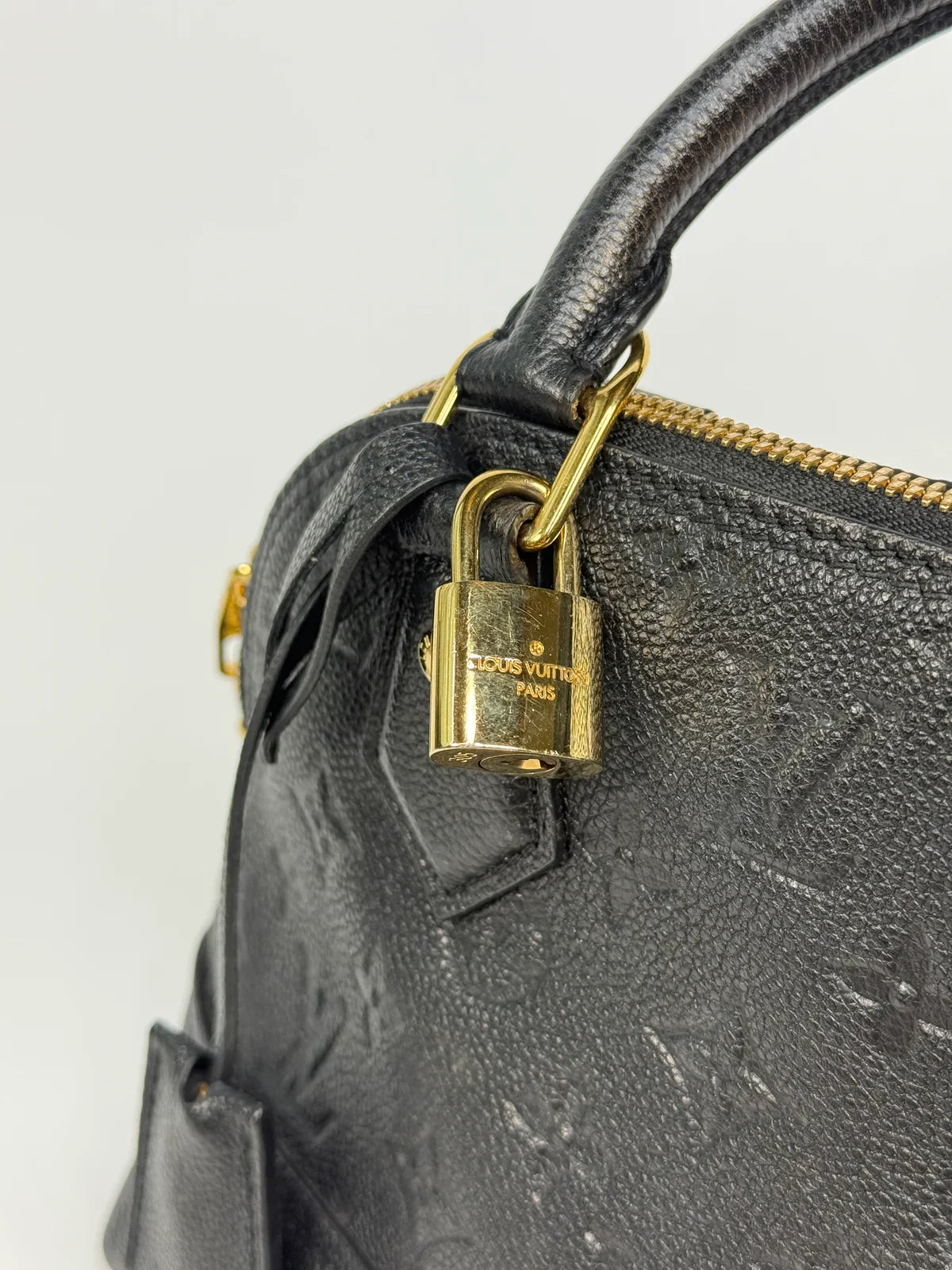 LOUIS VUITTON ALMA BB IN EMPREINTE BLACK MONOGRAM WITH GOLD HARDWARE