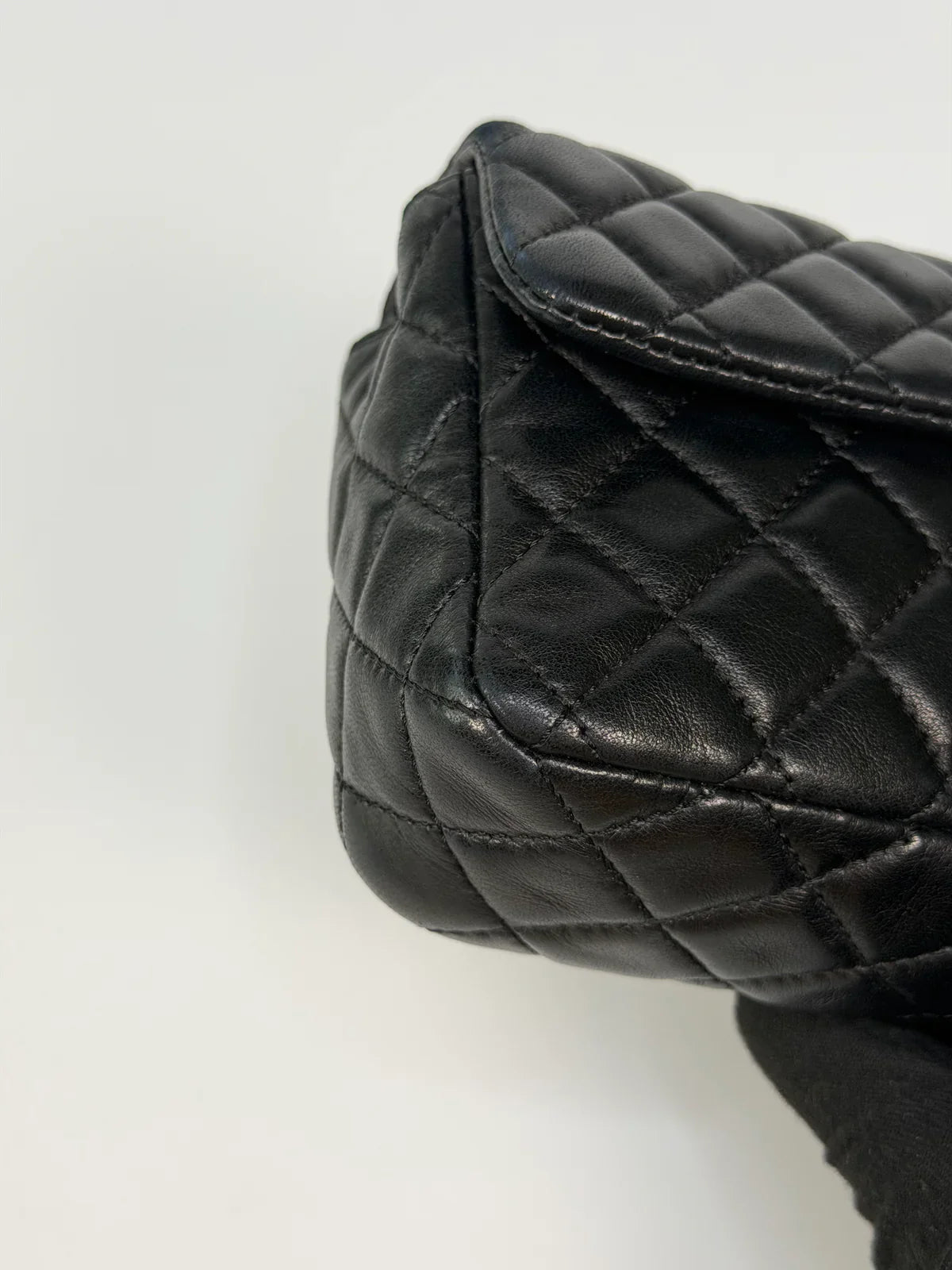 CHANEL EAST WEST CHARMS BAG IN BLACK LAMBSKIN LEATHER WITH GOLD HARDWARE