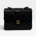 CHANEL BLACK SQUARE VINTAGE FLAP BAG IN LAMBSKIN WITH GOLD HARDWARE
