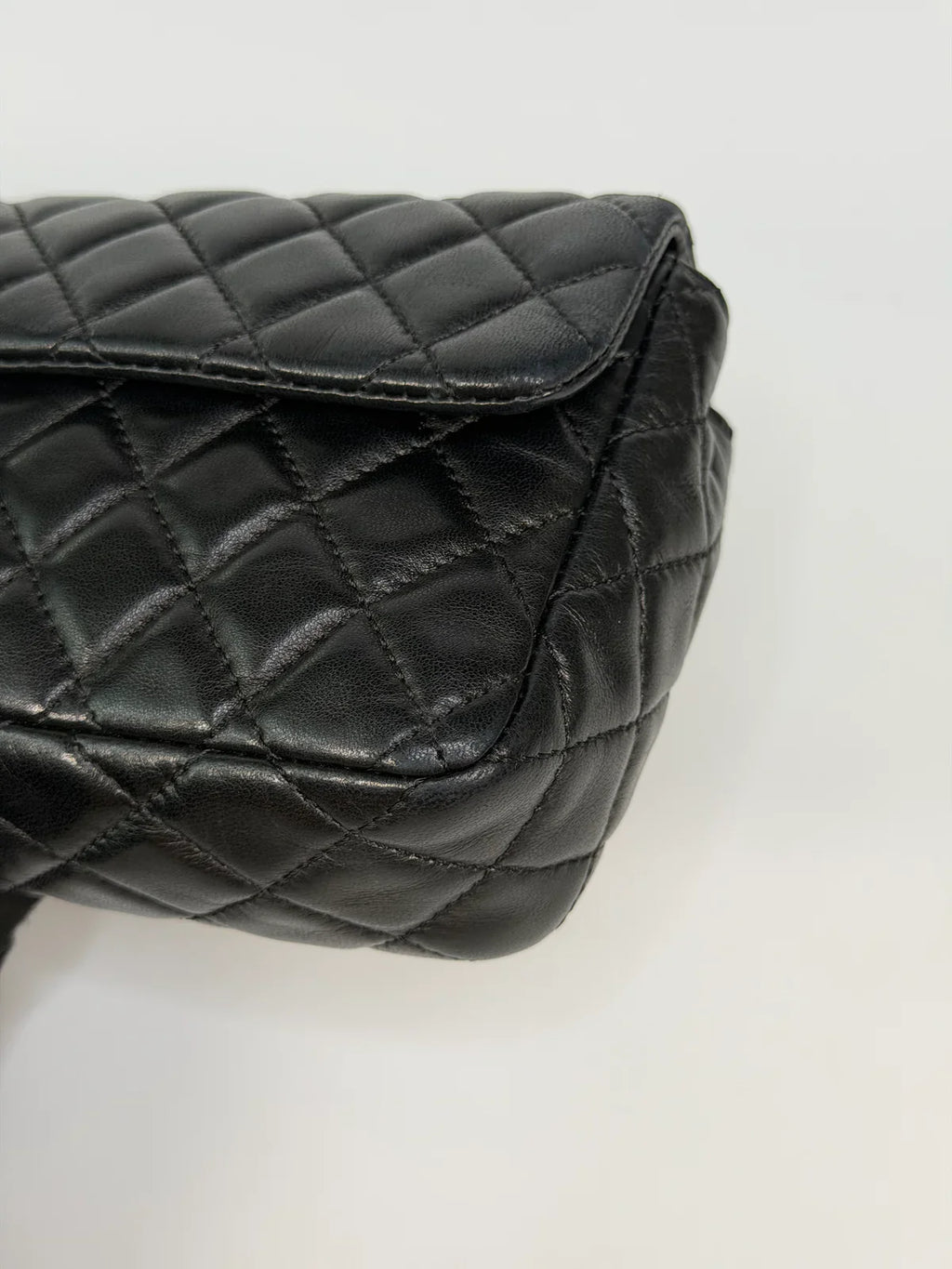 CHANEL EAST WEST CHARMS BAG IN BLACK LAMBSKIN LEATHER WITH GOLD HARDWARE