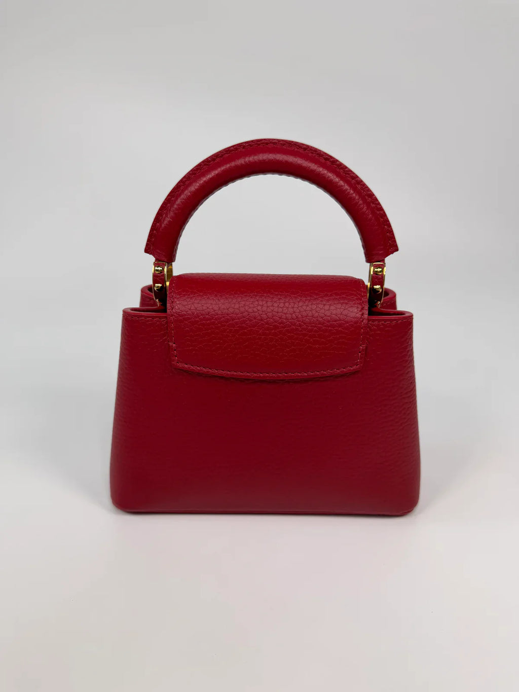 LOUIS VUITTON CAPUCINES MINI BAG IN SCARLET TAURILLION LEATHER WITH GOLD HARDWARE