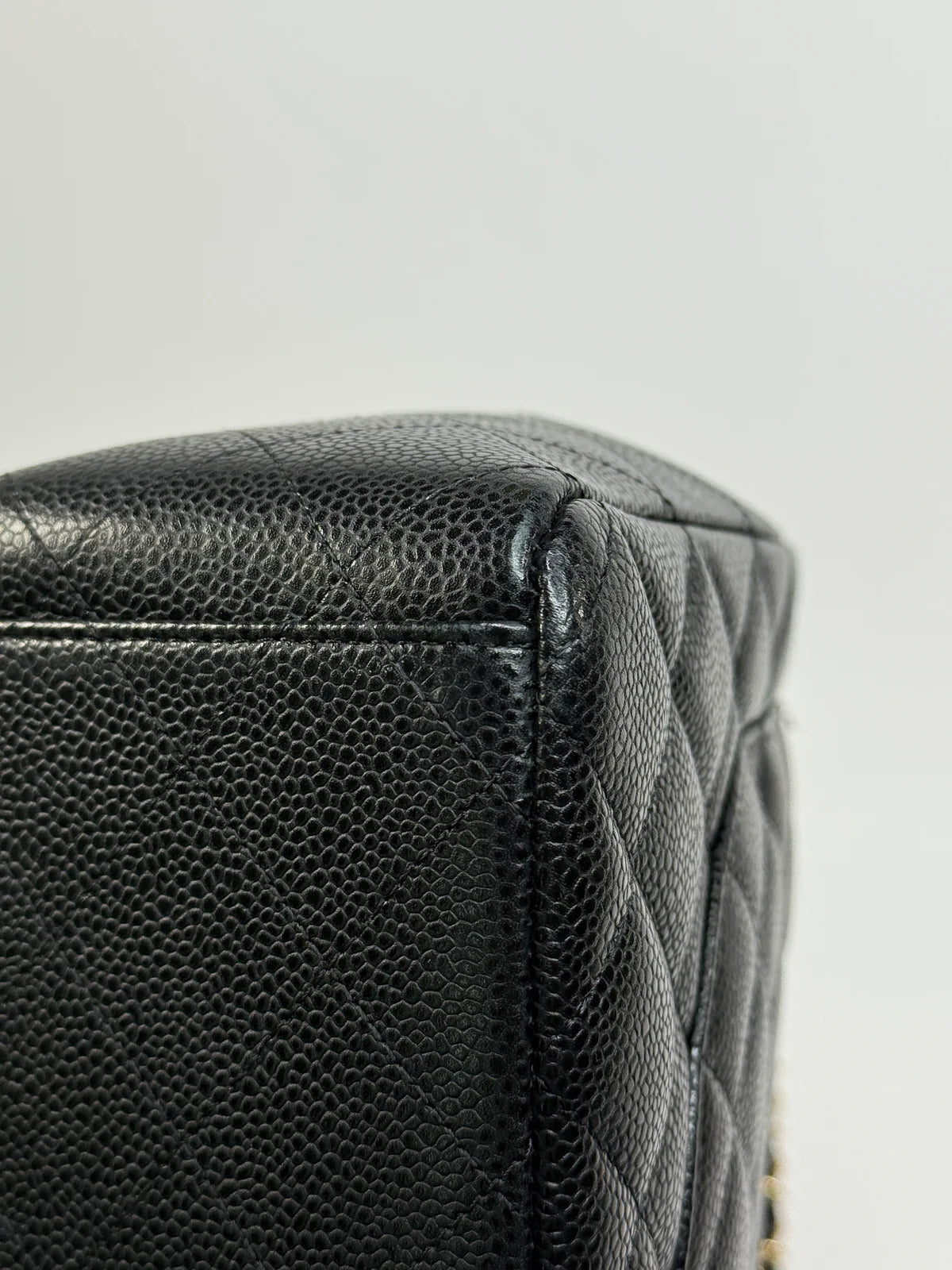 CHANEL MAXI CLASSIC DOUBLE FLAP IN BLACK CAVIAR LEATHER WITH GOLD HARDWARE