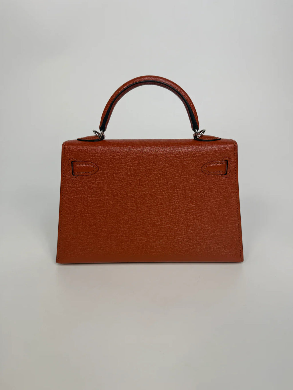 HERMÈS MINI KELLY IN CUIVRE CHÈVRE MYSORE LEATHER WITH PALLADIUM HARDWARE