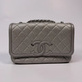 CHANEL CC FILIGREE WALLET ON CHAIN IN METALLIC SILVER
