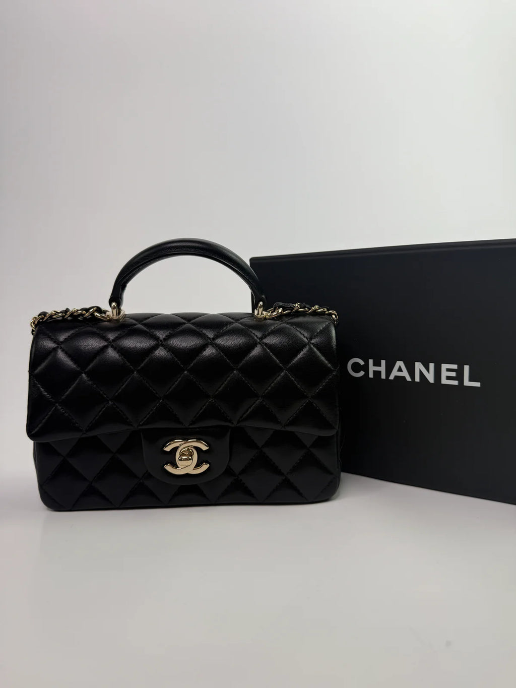 CHANEL MINI RECTANGLE TOP HANDLE IN BLACK LAMBSKIN WITH PGHW
