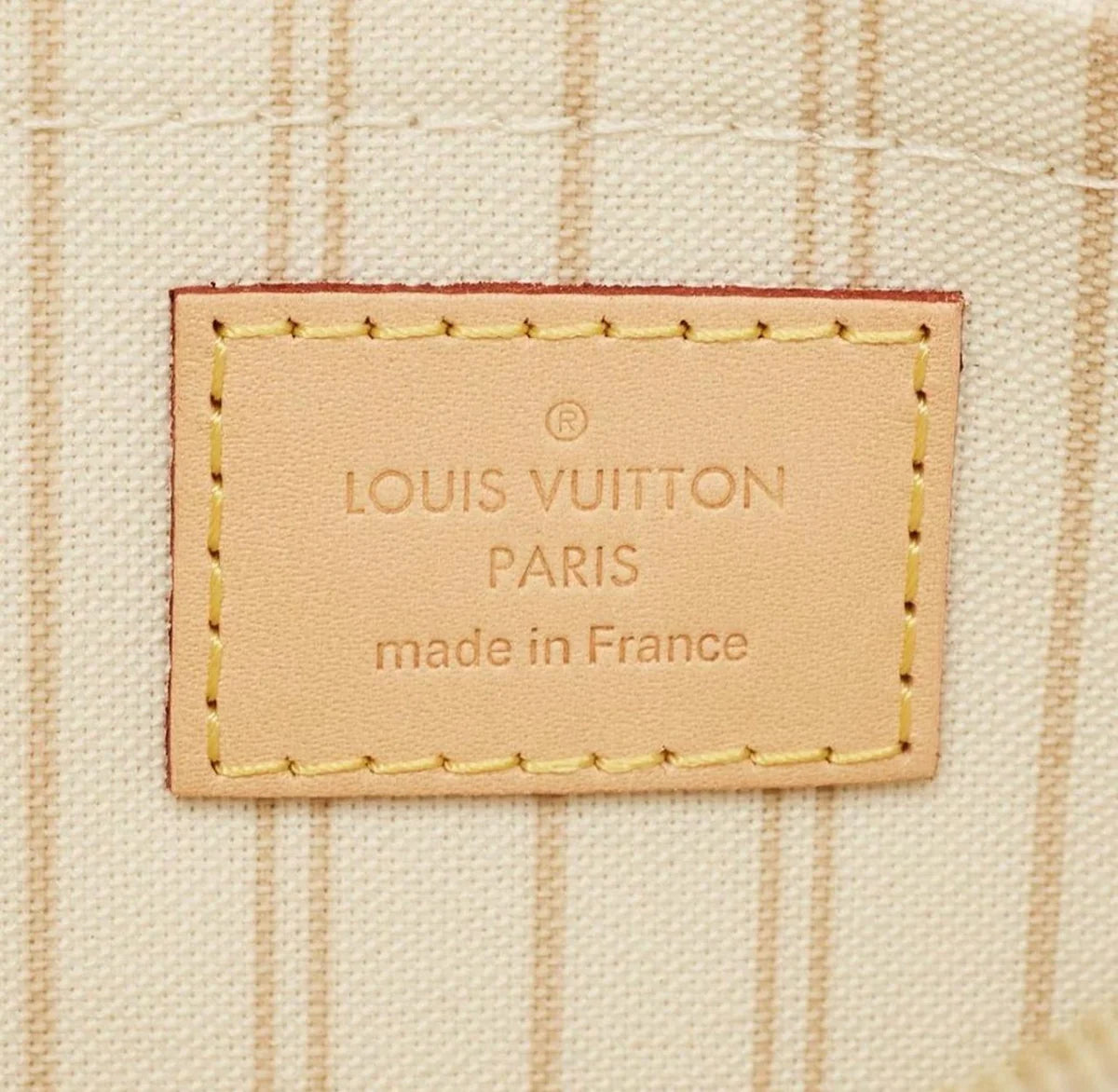 Louis Vuitton Neverfull White Coated Canvas Wristlet