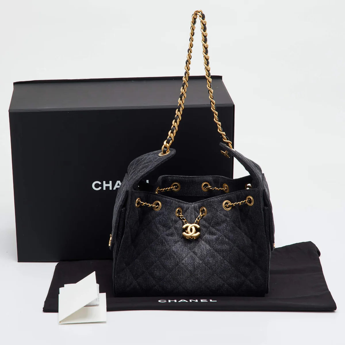 Chanel 25 Drawstring Black Quilted Denim Hobo