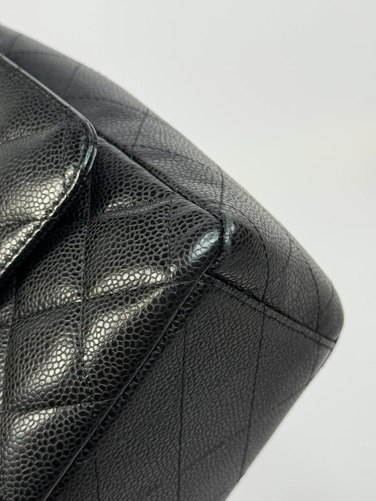 CHANEL MAXI CLASSIC DOUBLE FLAP IN BLACK CAVIAR LEATHER WITH GOLD HARDWARE