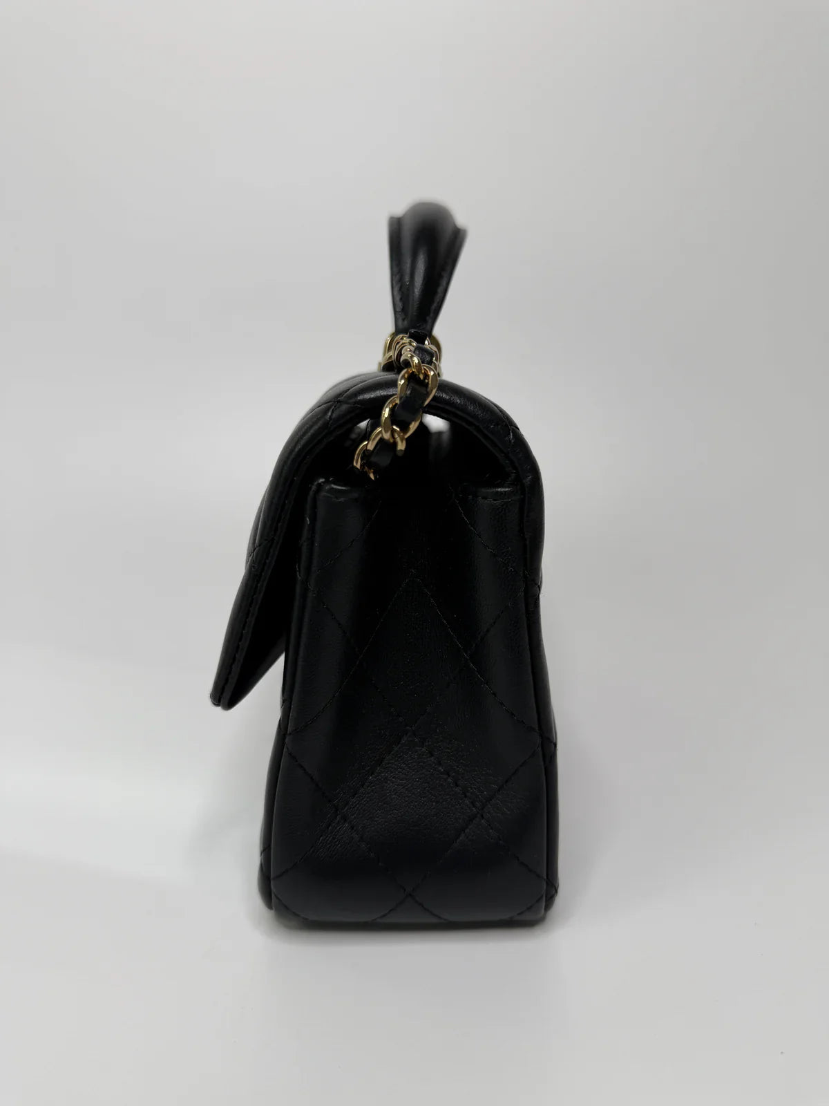 CHANEL MINI RECTANGLE TOP HANDLE FLAP BAG IN BLACK LAMBSKIN WITH PALE GOLD HARDWARE
