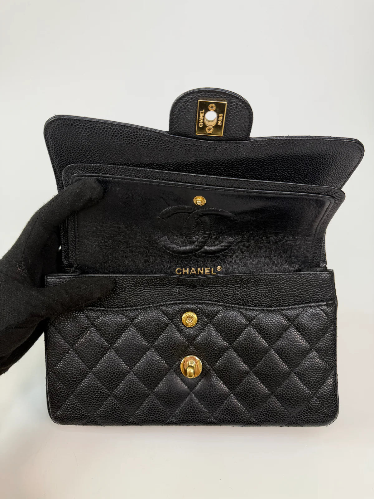 CHANEL SMALL CLASSIC DOUBLE FLAP IN BLACK CAVIAR LEATHER WITH GOLD HARDWARE
