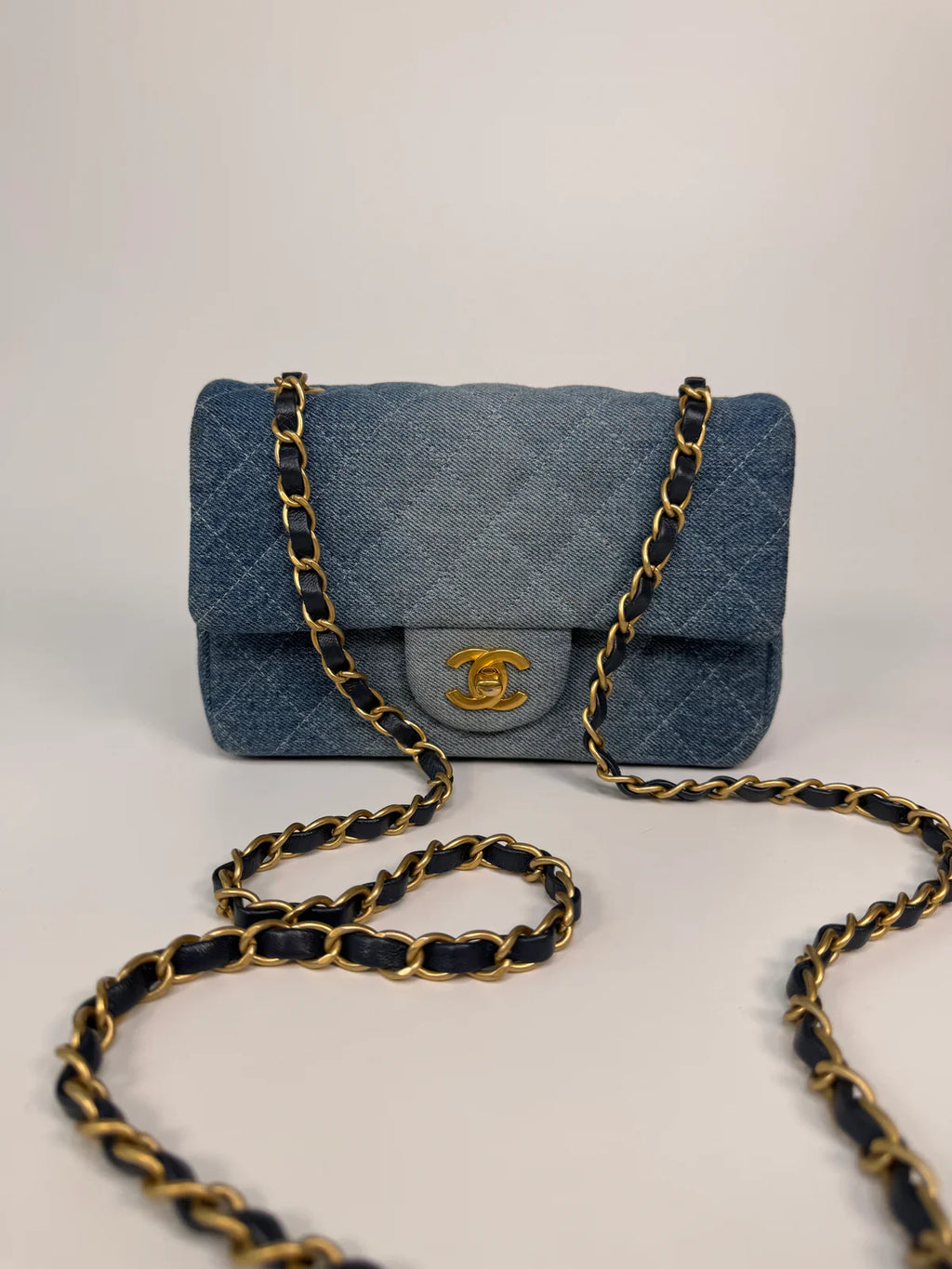 CHANEL MINI RECTANGLE IN BLUE DENIM WITH GOLD HARDWARE