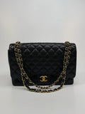CHANEL MAXI CLASSIC DOUBLE FLAP IN BLACK CAVIAR LEATHER WITH GOLD HARDWARE