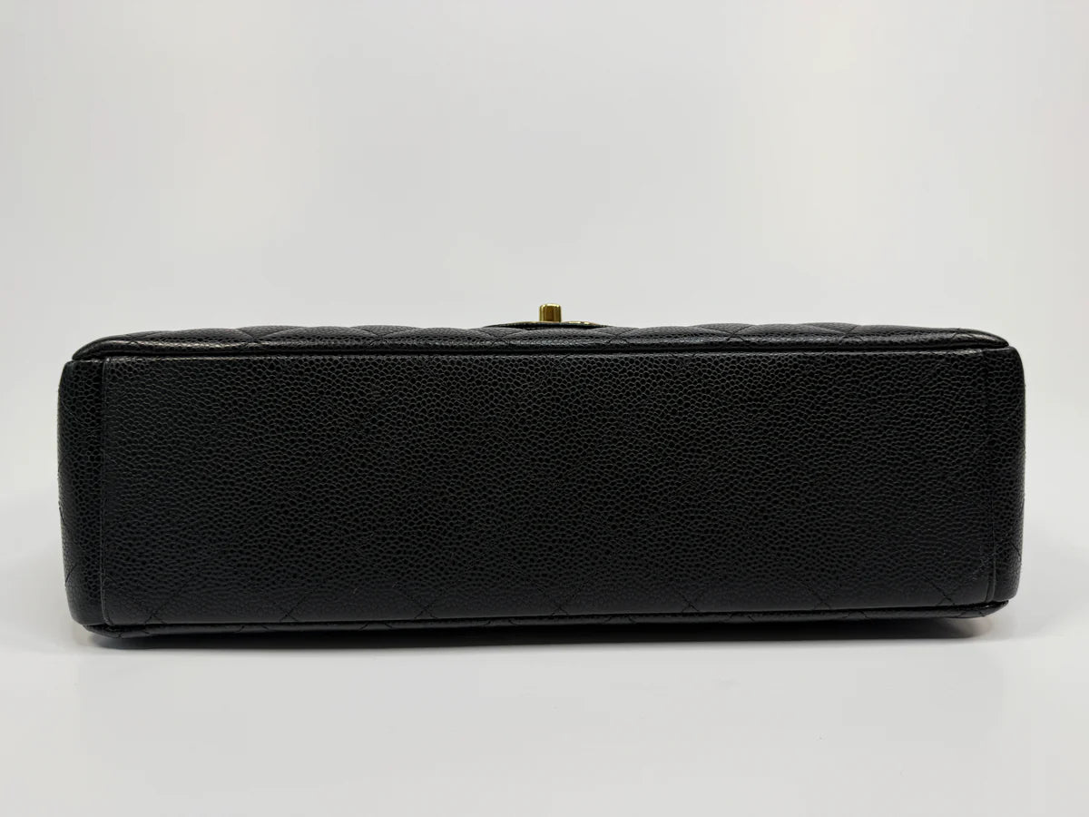 CHANEL MAXI CLASSIC DOUBLE FLAP IN BLACK CAVIAR LEATHER WITH GOLD HARDWARE