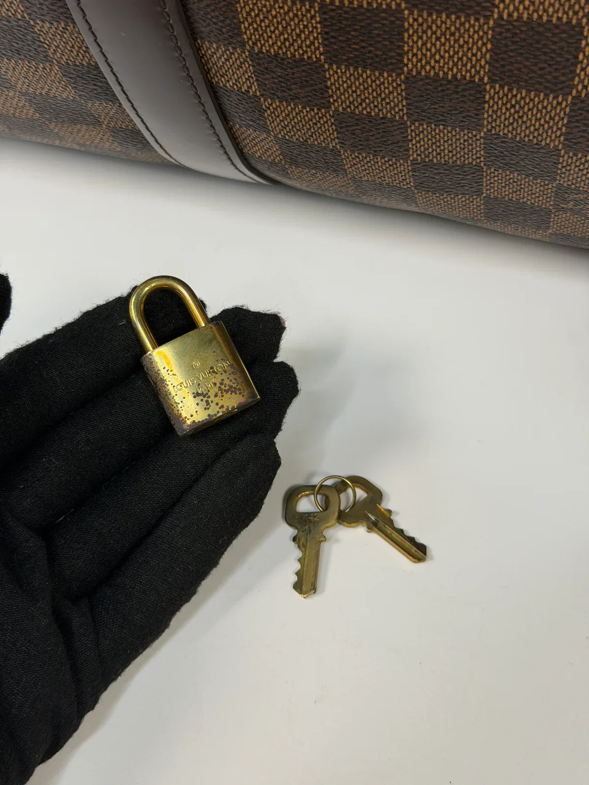 LOUIS VUITTON KEEPALL 55 IN DAMIER EBENE GOLD HARDWARE