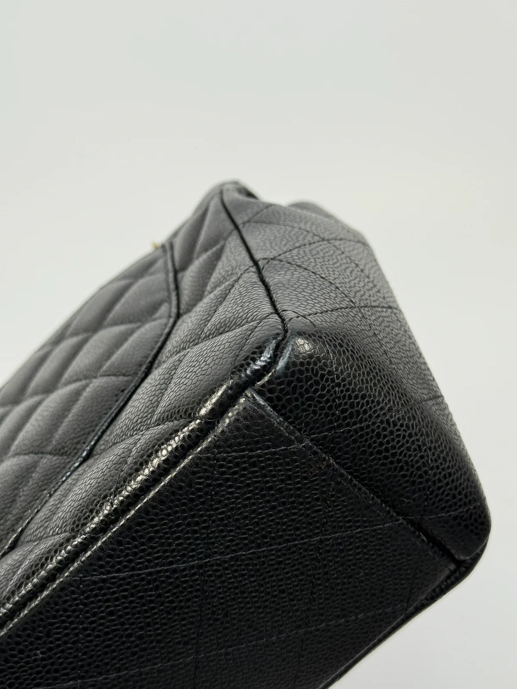 CHANEL MAXI CLASSIC DOUBLE FLAP IN BLACK CAVIAR LEATHER WITH GOLD HARDWARE