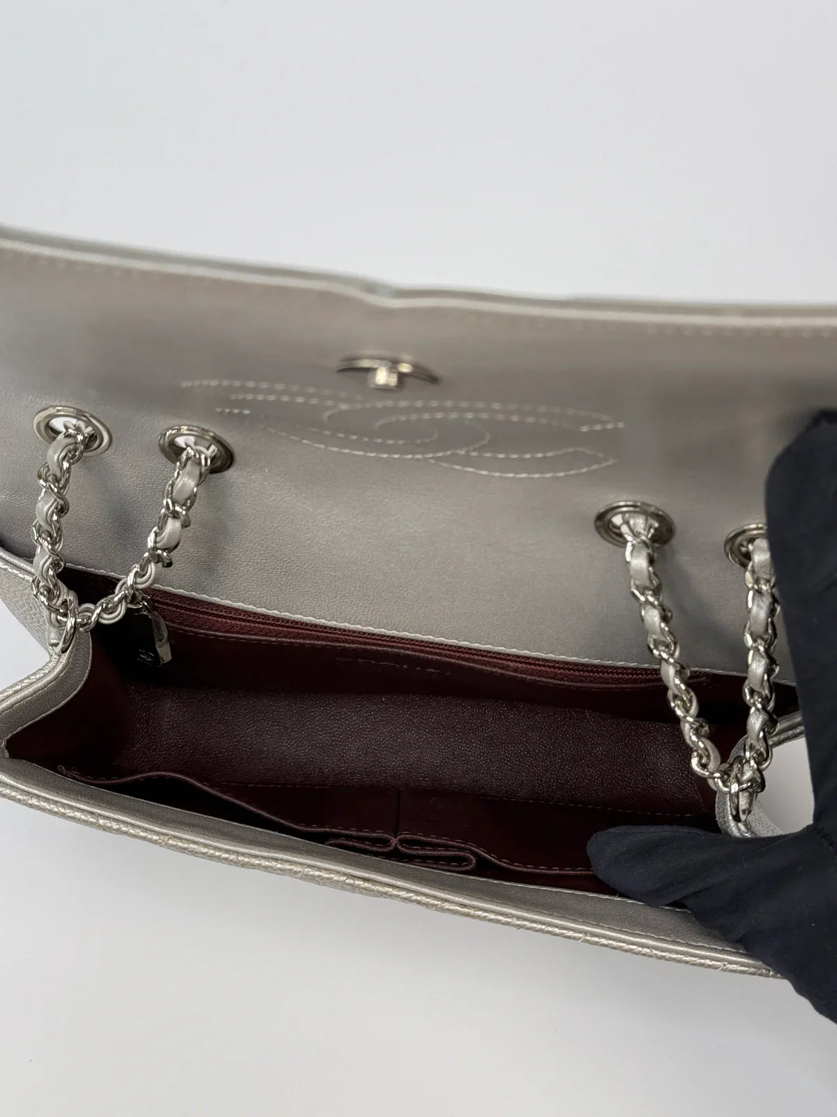 CHANEL CC FILIGREE WALLET ON CHAIN IN METALLIC SILVER