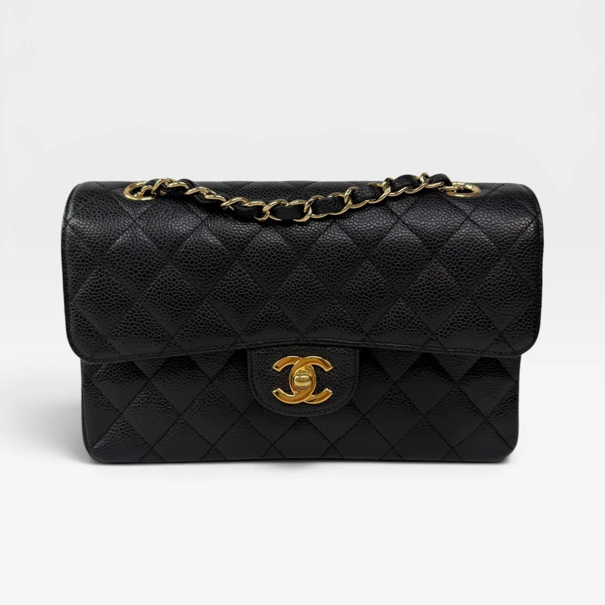 CHANEL SMALL CLASSIC DOUBLE FLAP IN BLACK CAVIAR LEATHER WITH GOLD HARDWARE