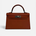 HERMÈS MINI KELLY IN CUIVRE CHÈVRE MYSORE LEATHER WITH PALLADIUM HARDWARE