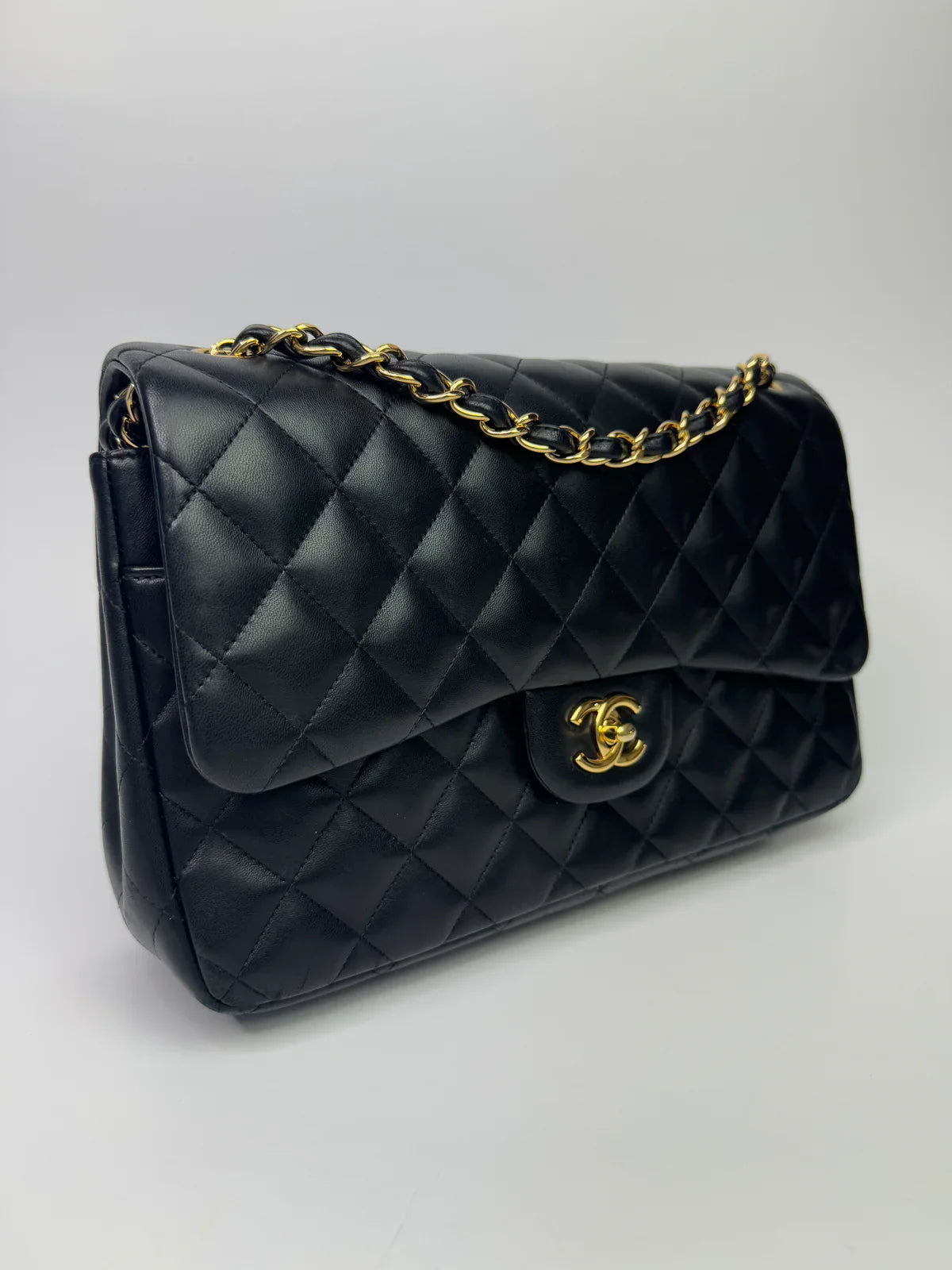 CHANEL BLACK LAMBSKIN LEATHER JUMBO CLASSIC DOUBLE FLAP GOLD HARDWARE