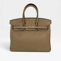 HERMÈS BIRKIN 25 IN TRENCH SWIFT LEATHER WITH GOLD HARDWARE