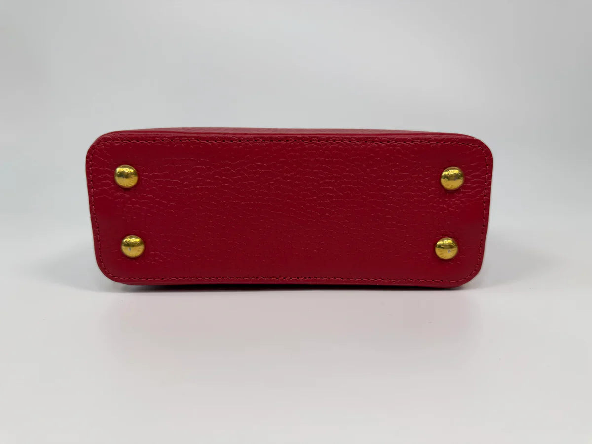 LOUIS VUITTON CAPUCINES MINI BAG IN SCARLET TAURILLION LEATHER WITH GOLD HARDWARE