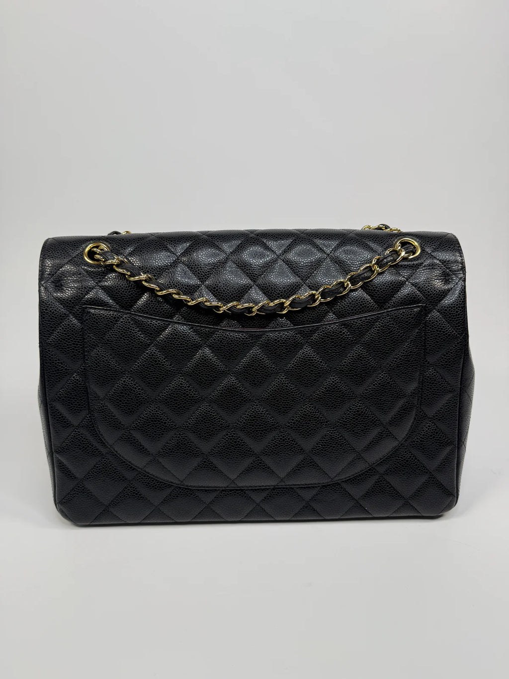 CHANEL MAXI CLASSIC DOUBLE FLAP IN BLACK CAVIAR LEATHER WITH GOLD HARDWARE