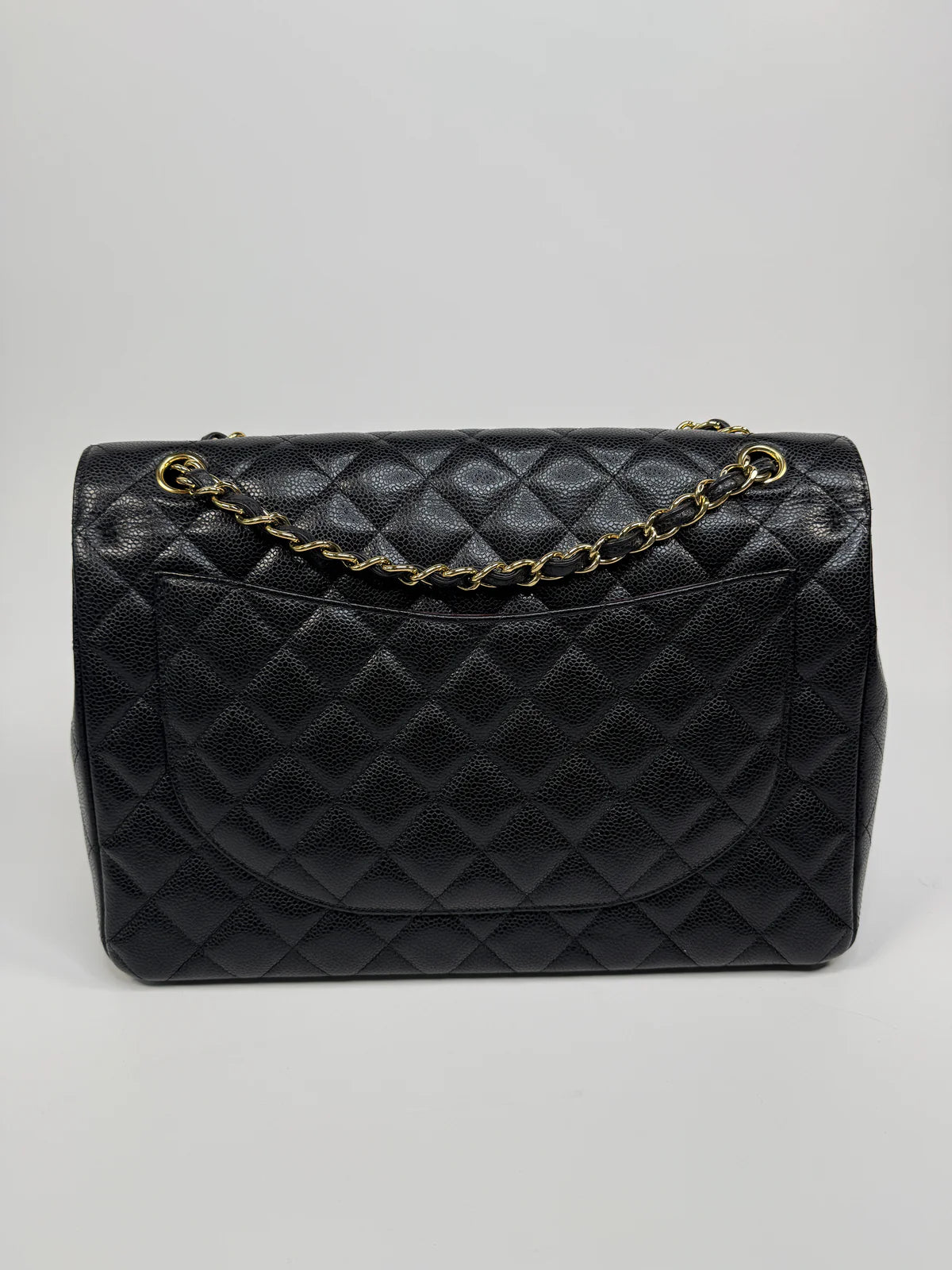 CHANEL MAXI CLASSIC DOUBLE FLAP IN BLACK CAVIAR LEATHER WITH GOLD HARDWARE