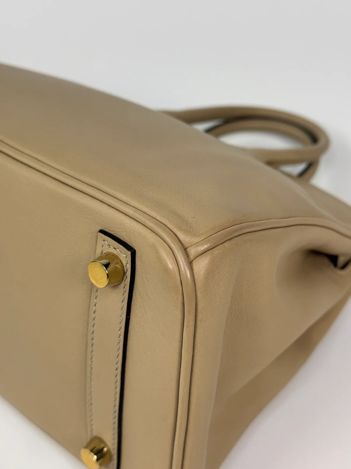 HERMÈS BIRKIN 25 IN TRENCH SWIFT LEATHER WITH GOLD HARDWARE