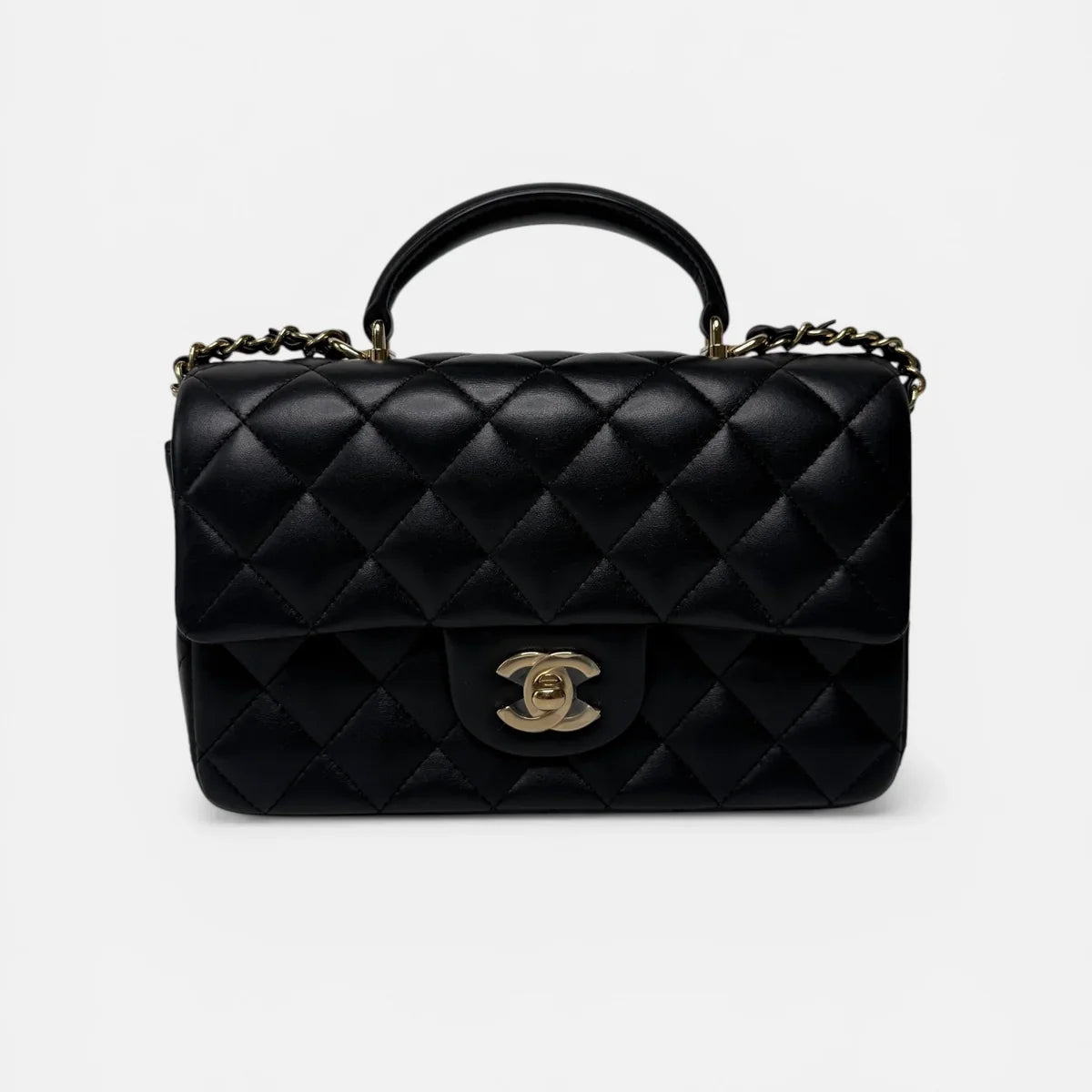 CHANEL MINI RECTANGLE TOP HANDLE FLAP BAG IN BLACK LAMBSKIN WITH PALE GOLD HARDWARE