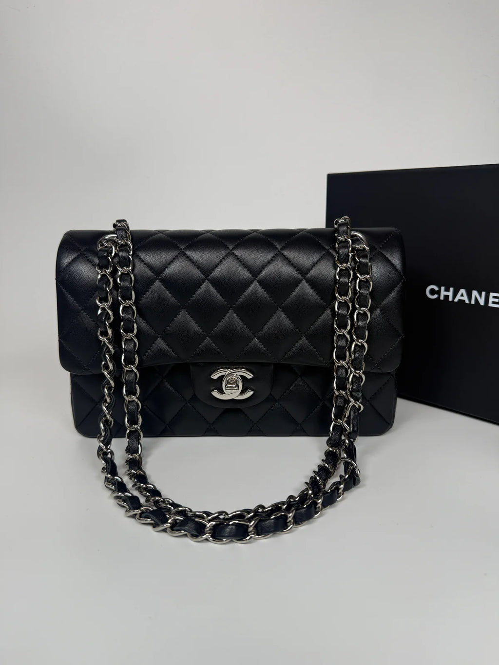 CHANEL SMALL CLASSIC DOUBLE FLAP IN BLACK LAMBSKIN LEATHER WITH SILVER HARDWARE