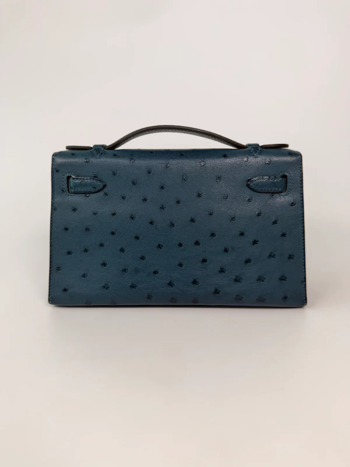 HERMÉS KELLY POCHETTE IN COLVERT OSTRICH WITH GOLD HARDWARE