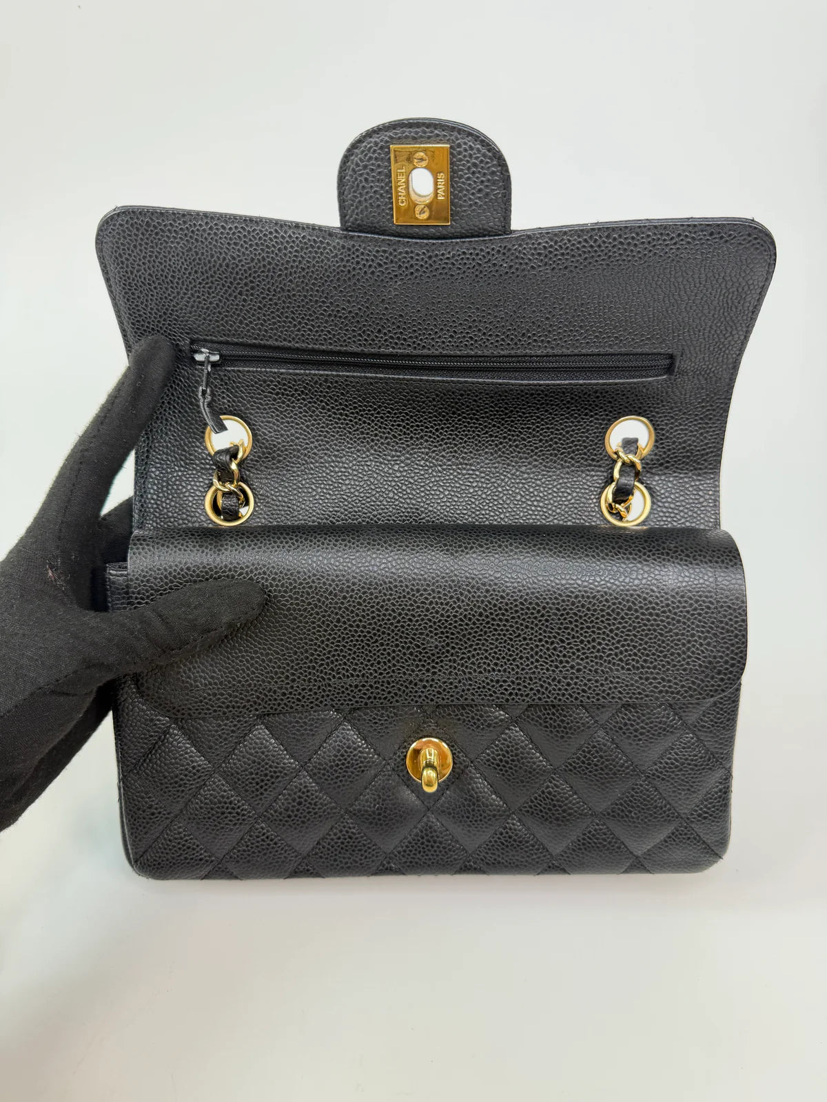 CHANEL SMALL CLASSIC DOUBLE FLAP IN BLACK CAVIAR LEATHER WITH GOLD HARDWARE