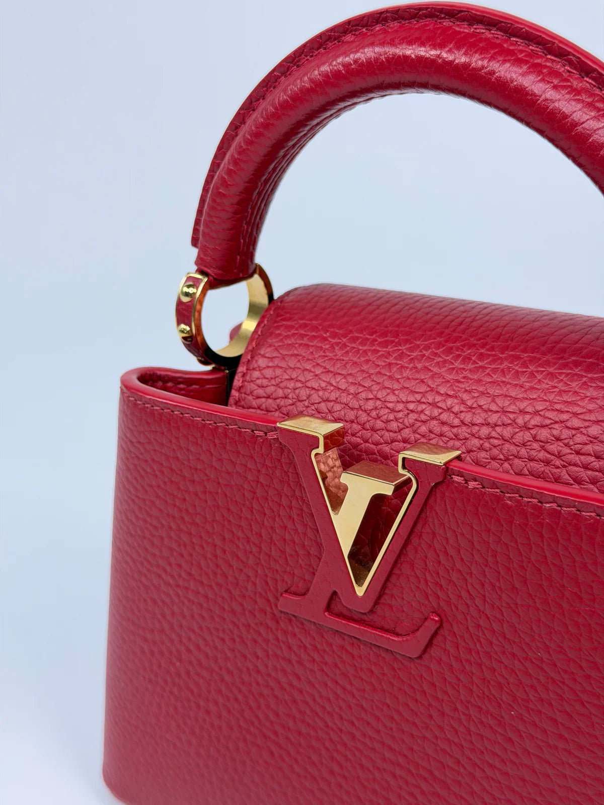 LOUIS VUITTON CAPUCINES MINI BAG IN SCARLET TAURILLION LEATHER WITH GOLD HARDWARE