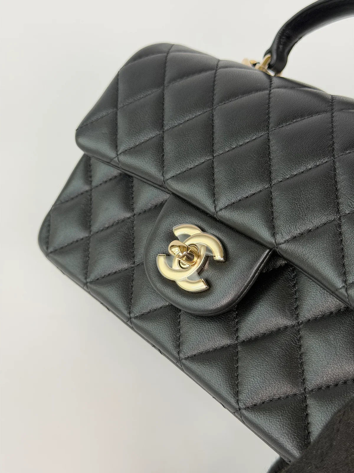 CHANEL MINI RECTANGLE TOP HANDLE IN BLACK LAMBSKIN LEATHER WITH PALE GOLD HARDWARE