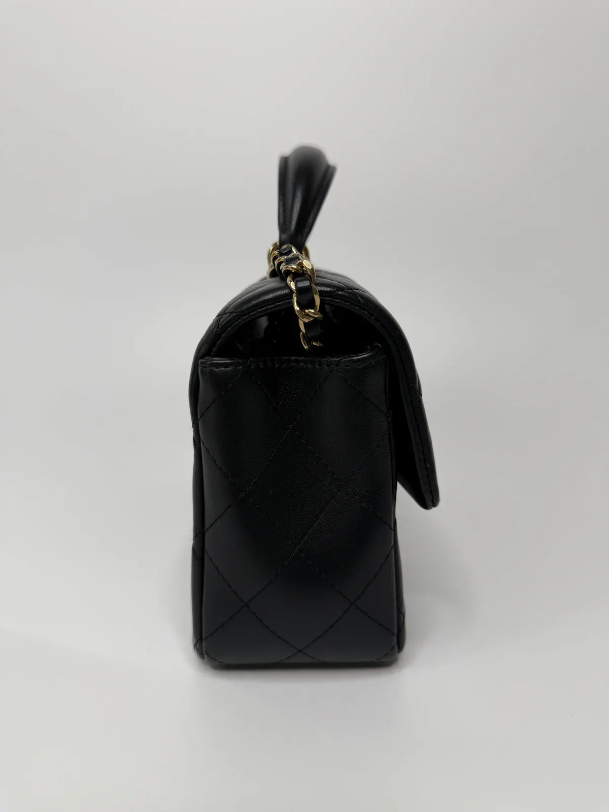 CHANEL MINI RECTANGLE TOP HANDLE FLAP BAG IN BLACK LAMBSKIN WITH PALE GOLD HARDWARE