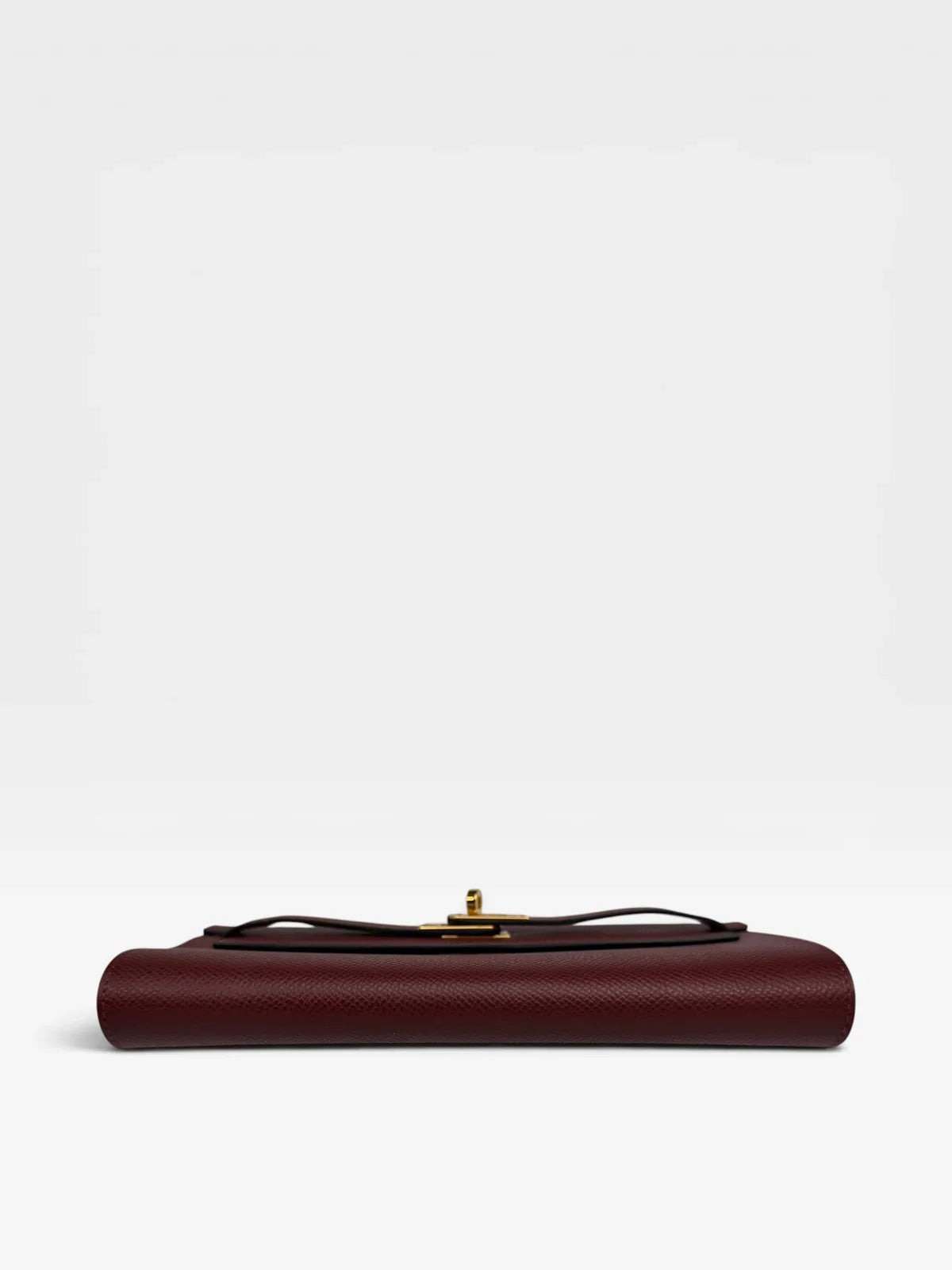 HERMÈS KELLY TO GO IN BURGUNDY EPSOM LEATHER WITH GOLD HARDWARE